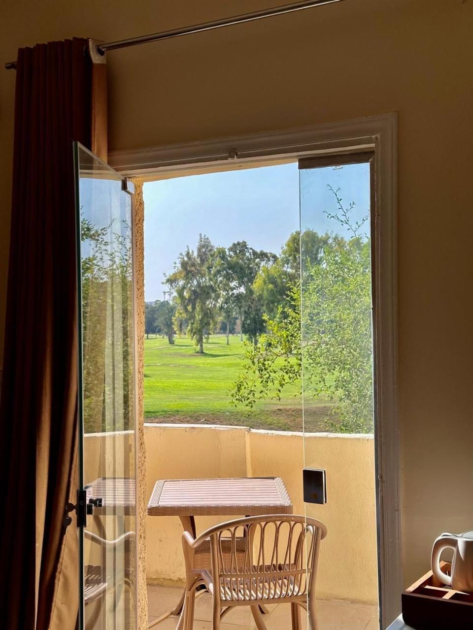 Golf Pyramids View Hotel Kafret el-Gabal Buitenkant foto